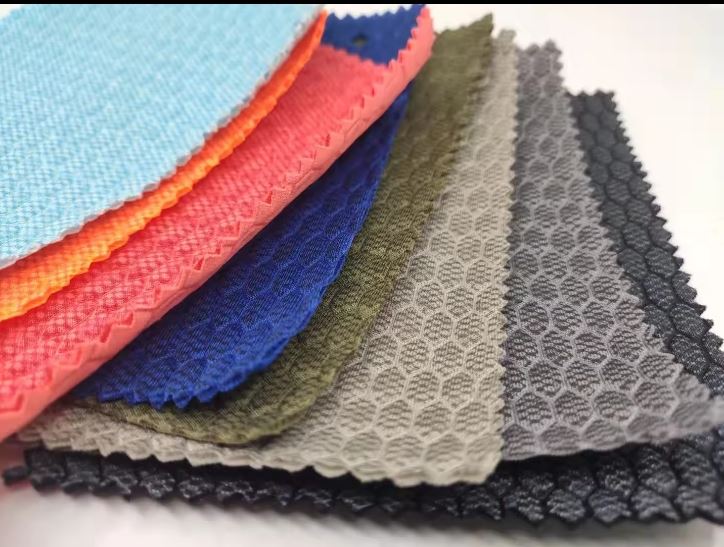 Best-selling Breathable Embossed Polyester Knitted Honeycomb Pattern Fabric Shoe Fabric Mesh Shoe Material